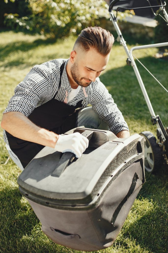 Man Mowing the Lawn
