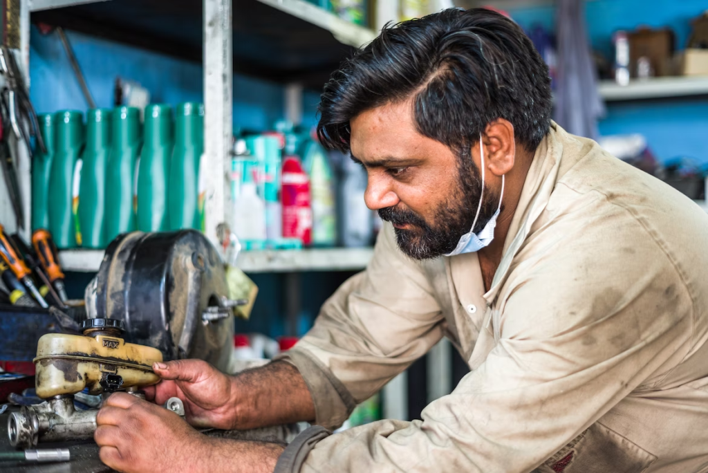 person repairing something with tools