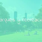 A vibrant city park with people jogging, picnicking, and relaxing on green grass under sunny skies, surrounded by tall trees and a playground, lively and peaceful atmosphere, realistic.