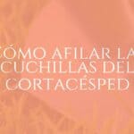 Sharp lawnmower blade on a grassy background, close-up, metallic shine, realistic.