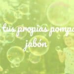 Colorful soap bubbles floating in the air, children playing outdoors, bright sunlight, joyful and vibrant atmosphere, realistic.